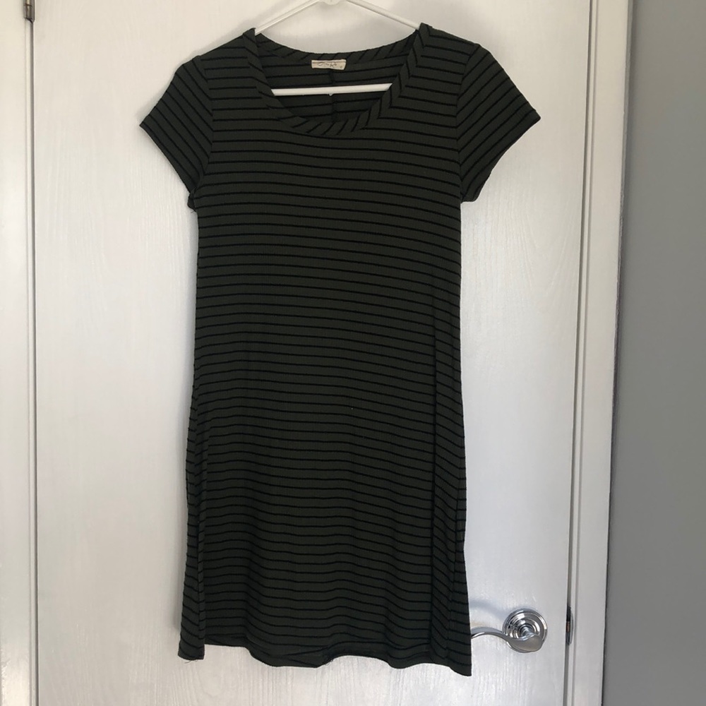 Knee length dress.
